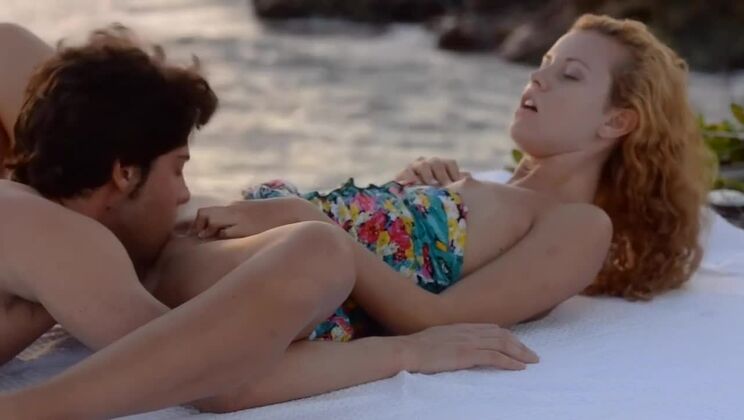 Cumshot on Blonde in Paradise Setting