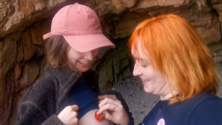 Effy and Grainne Flashing and Spitting Strawberries Outdoors